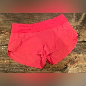 LULULEMON 2.5 in speed up shorts - carnation red